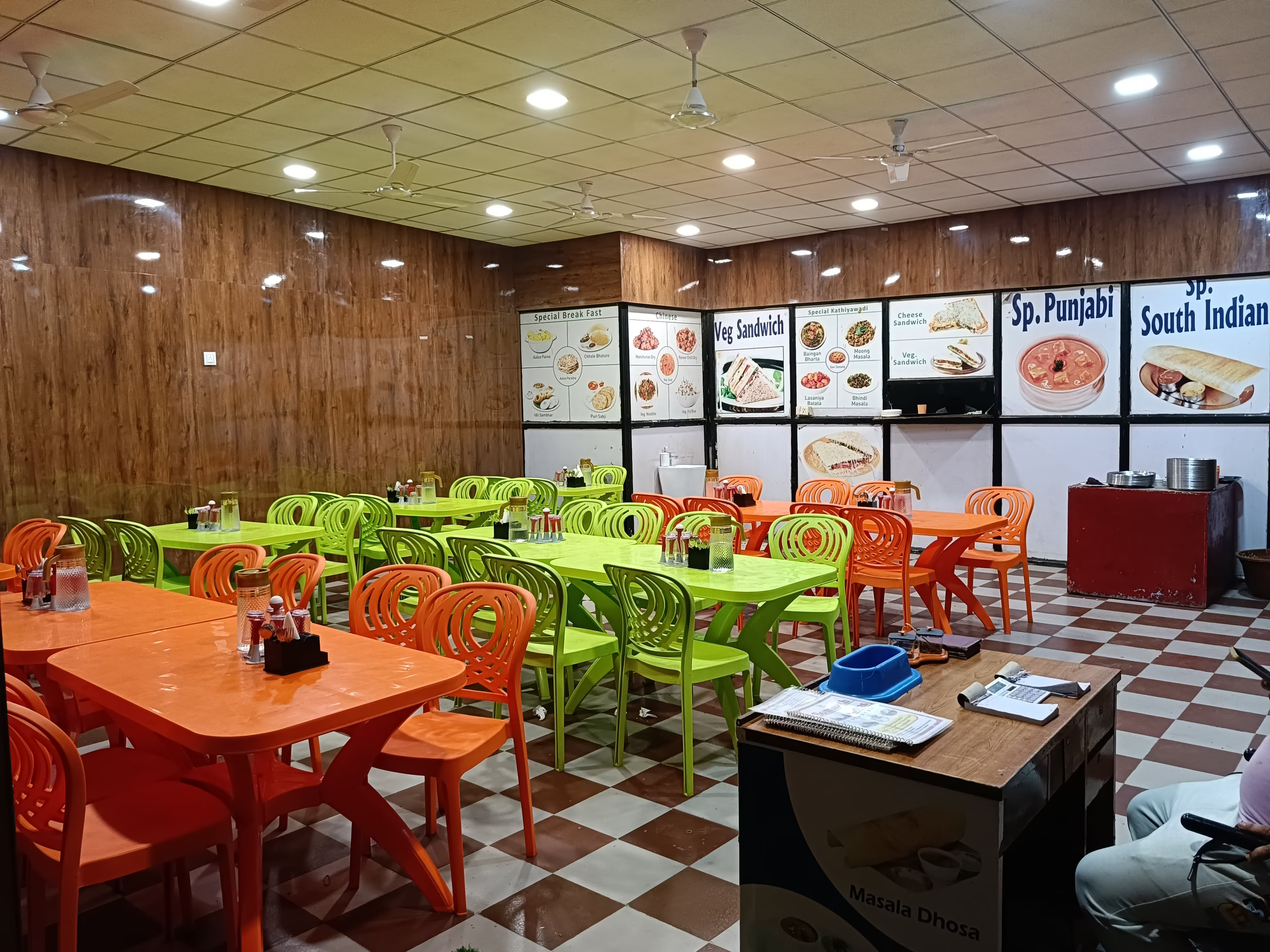 Comfortable dining area at Hotel Somnath Atithigruh, perfect for enjoying meals during your stay in Somnath.