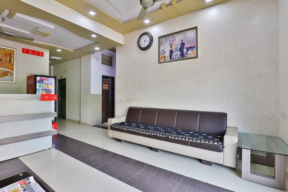 Spacious and inviting lobby of Hotel Somnath Atithigruh, a welcoming space for guests.